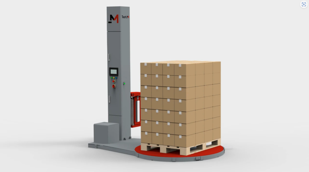 DNC Pallet Stretch Wrapper. A pallet wrapping machine with a tall vertical column and control panel efficiently wraps several stacked cardboard boxes on a red, circular platform. The carton assembly is secured on a wooden pallet. The gray machine features minimal branding.