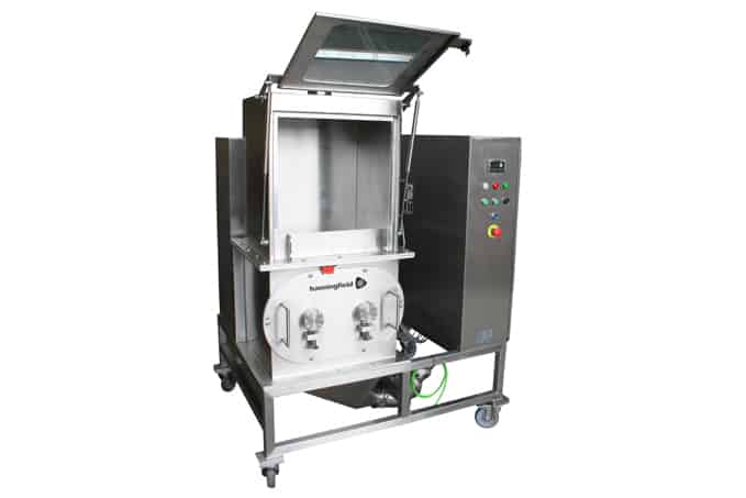 Hanningfield Lump Breaker. Stainless steel industrial machine on wheels with an open top lid and control panel. Featuring two dials and various buttons, this unit is designed for efficient powder processing and containment, ideal for mixing materials securely.