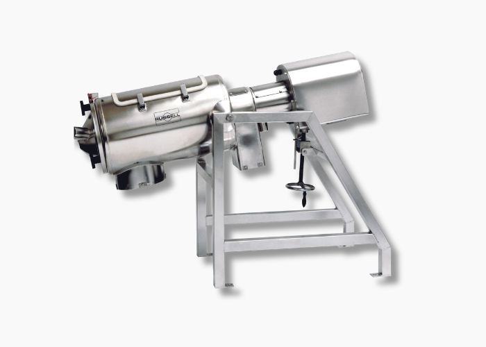 A stainless steel industrial mixer or blender with a cylindrical chamber mounted on a sturdy metal frame, designed for processing or mixing materials in bakery and other industrial settings.